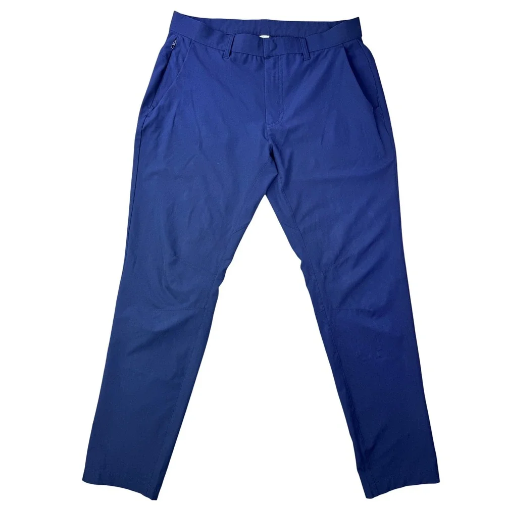 Fabletics Men's Navy Blue Performance Pants Tech Stretch Tapered Leg Size 33